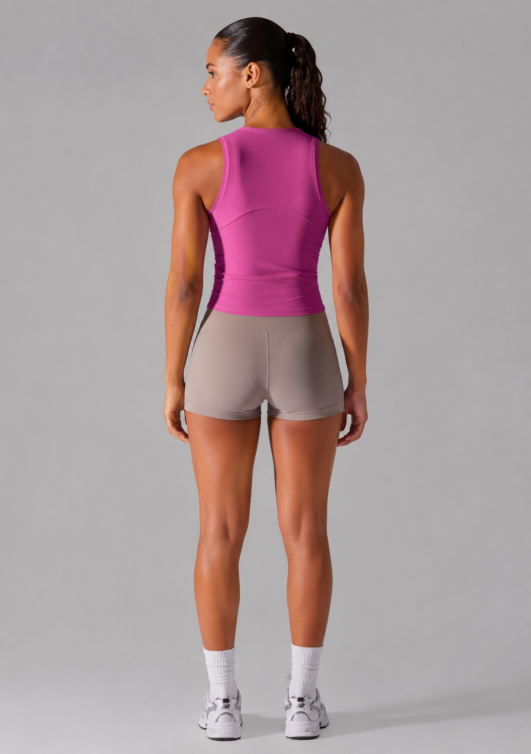 sport tank top women hot pink back side view standing
