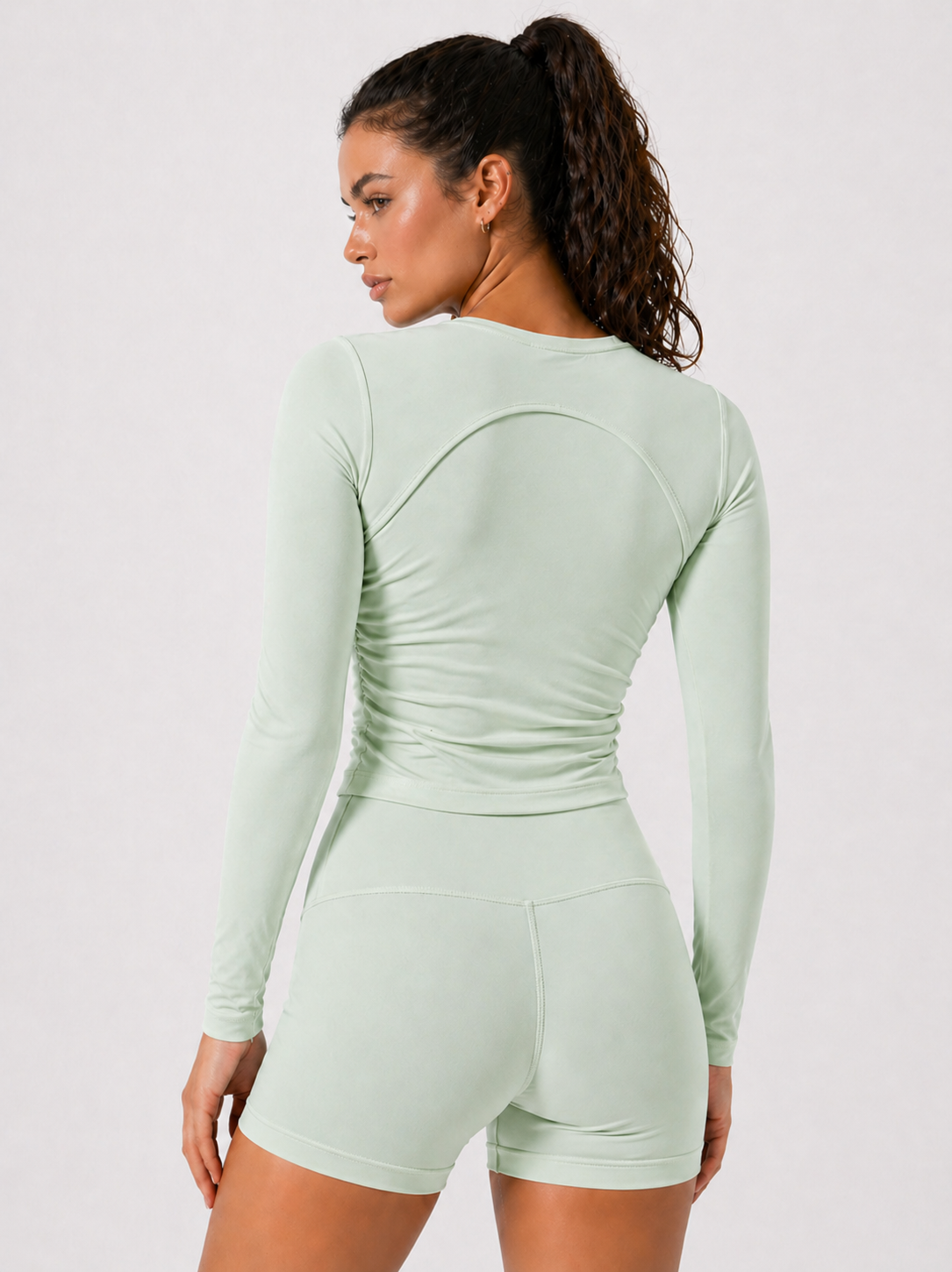 long sleeve training top women light green back view