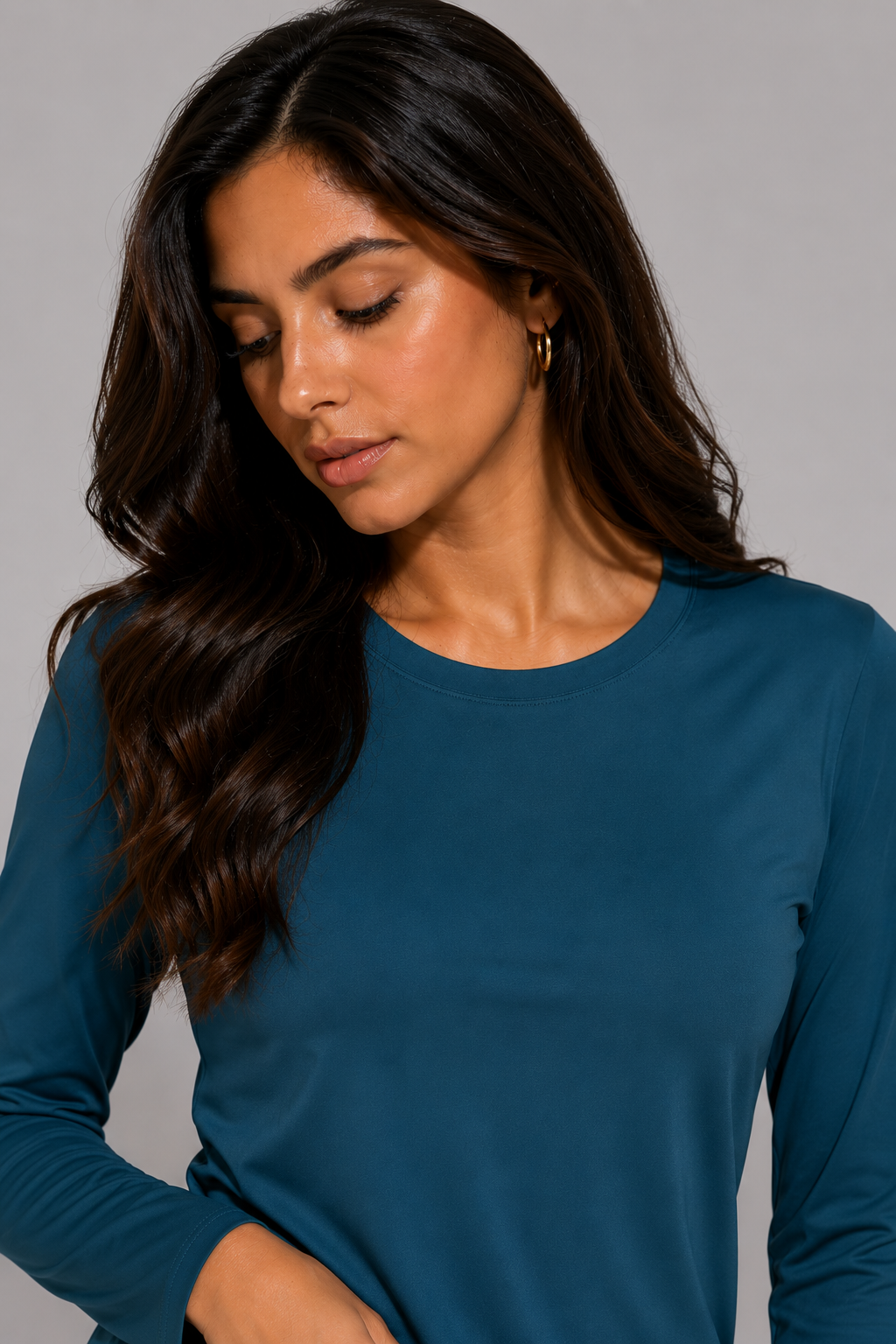 women’s long sleeve active top sea blue portrait close up