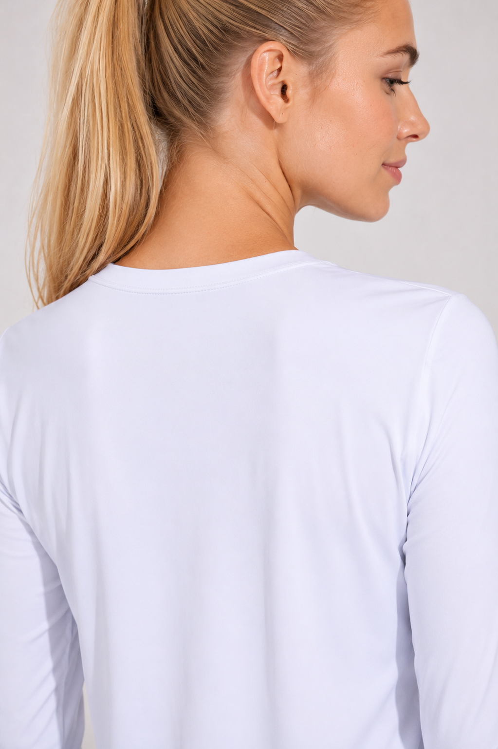 women’s long sleeve active top white side profile